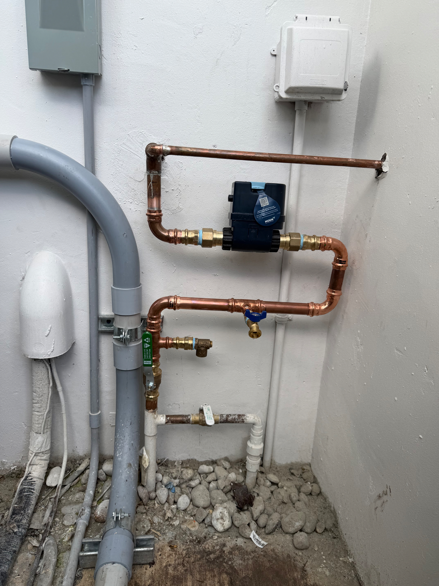 Rebuilt main water line in polished copper with a Moen Flo smart shutoff valve installed by Better Call Sam Plumbing in Naples, FL